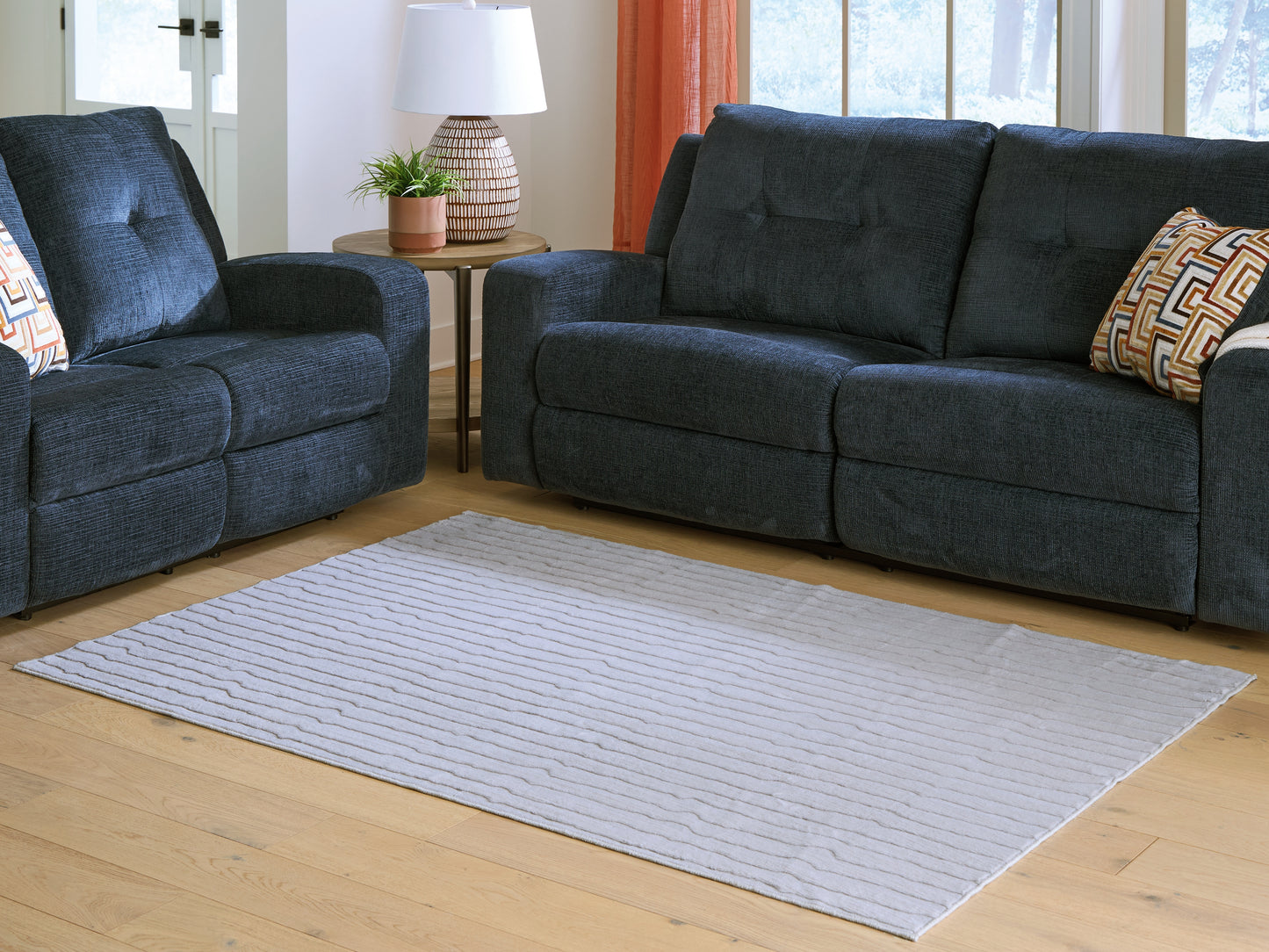 The Furniture Outlets - Ashley Furniture - Worthley Rug - Washable 5' x 7' Area Rug / Gray - R407452