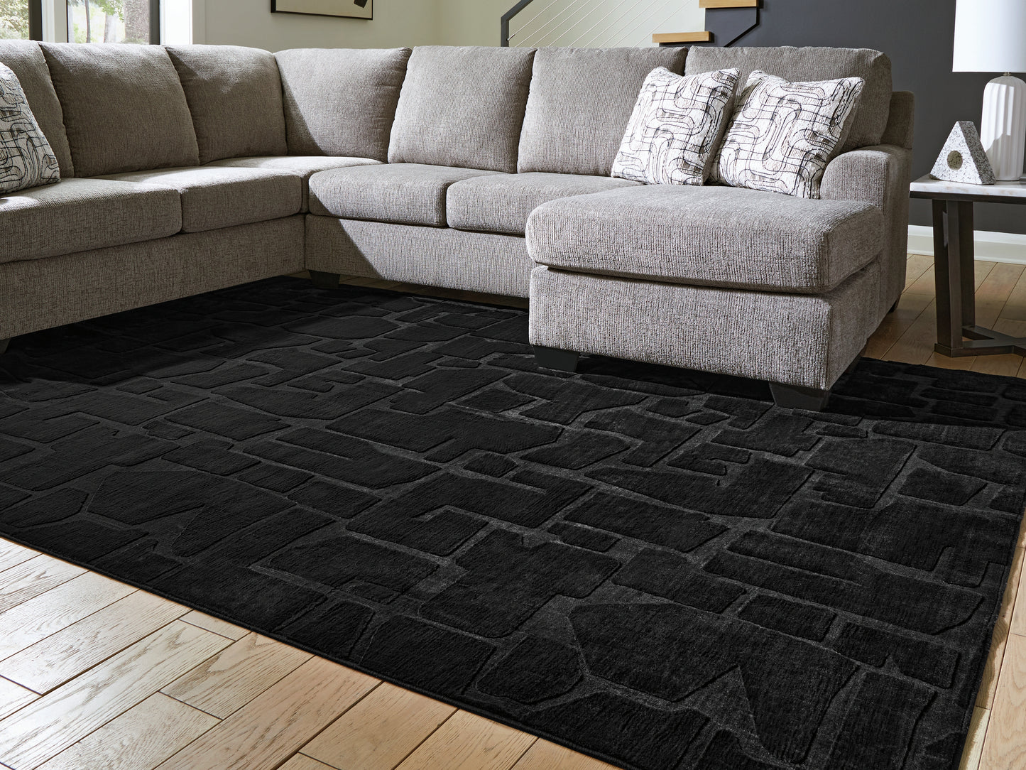 The Furniture Outlets - Ashley Furniture - Gibbswell Rug - Washable 8' x 10' Area Rug / Black - R407461