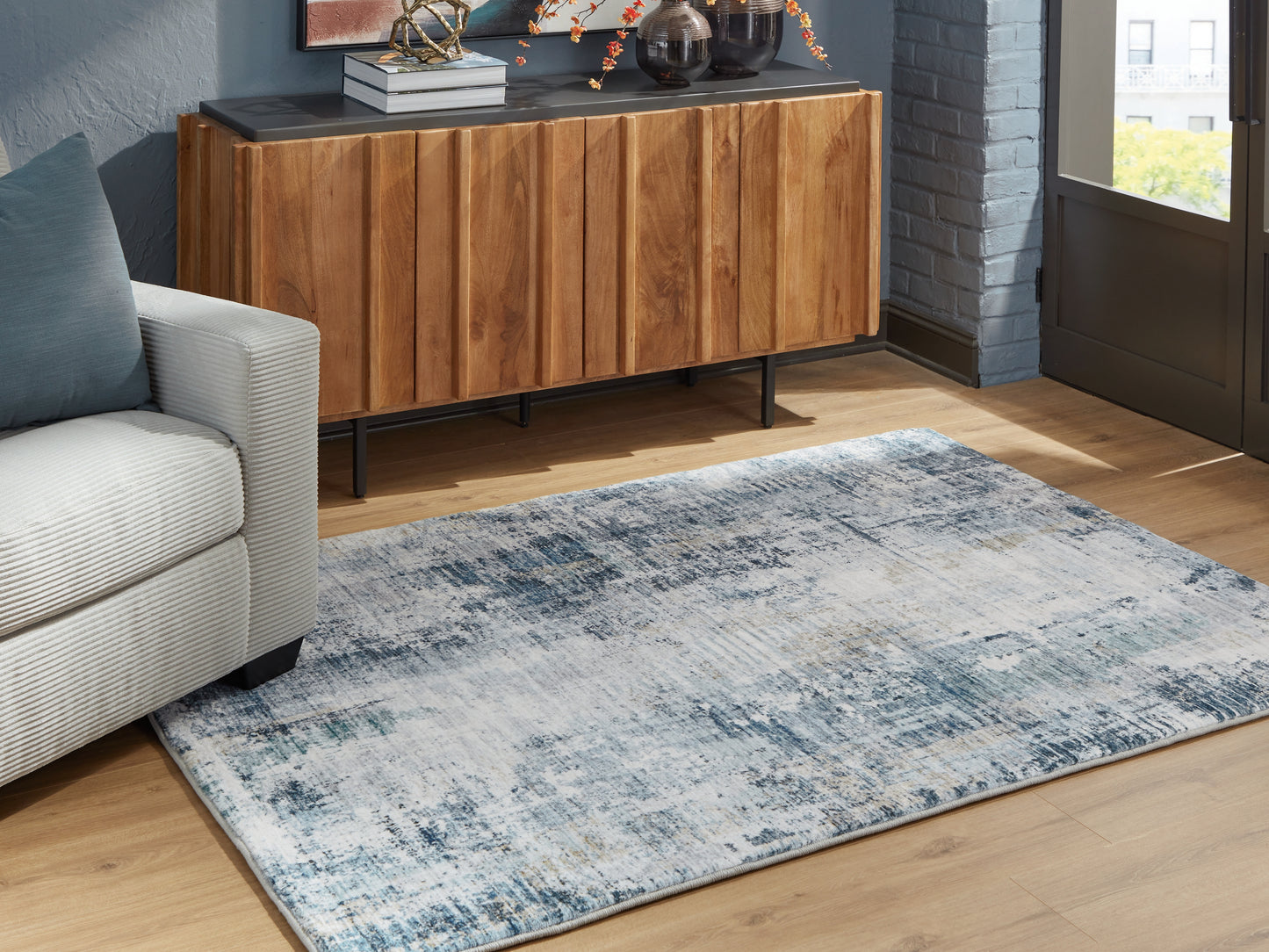 The Furniture Outlets - Ashley Furniture - Arlenmont Rug - 5' x 7' Area Rug / Blue/White/Brown - R407482