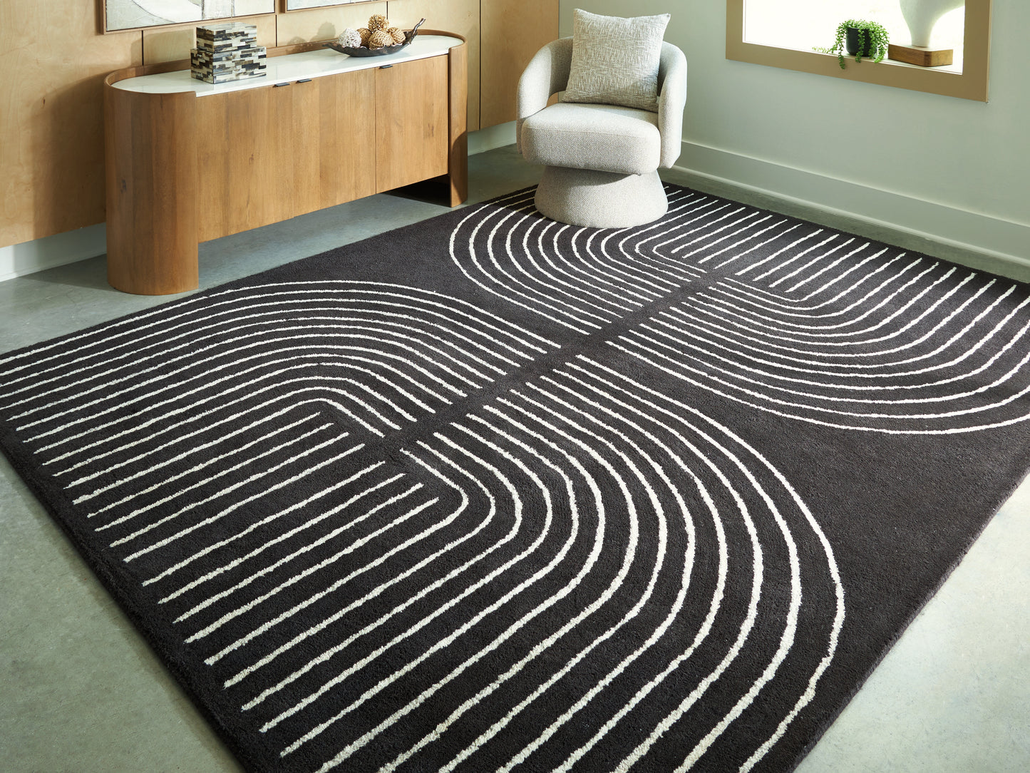 The Furniture Outlets - Ashley Furniture - Eldonmore Rug - 7'8" x 10' Area Rug / Black/Ivory - R407571