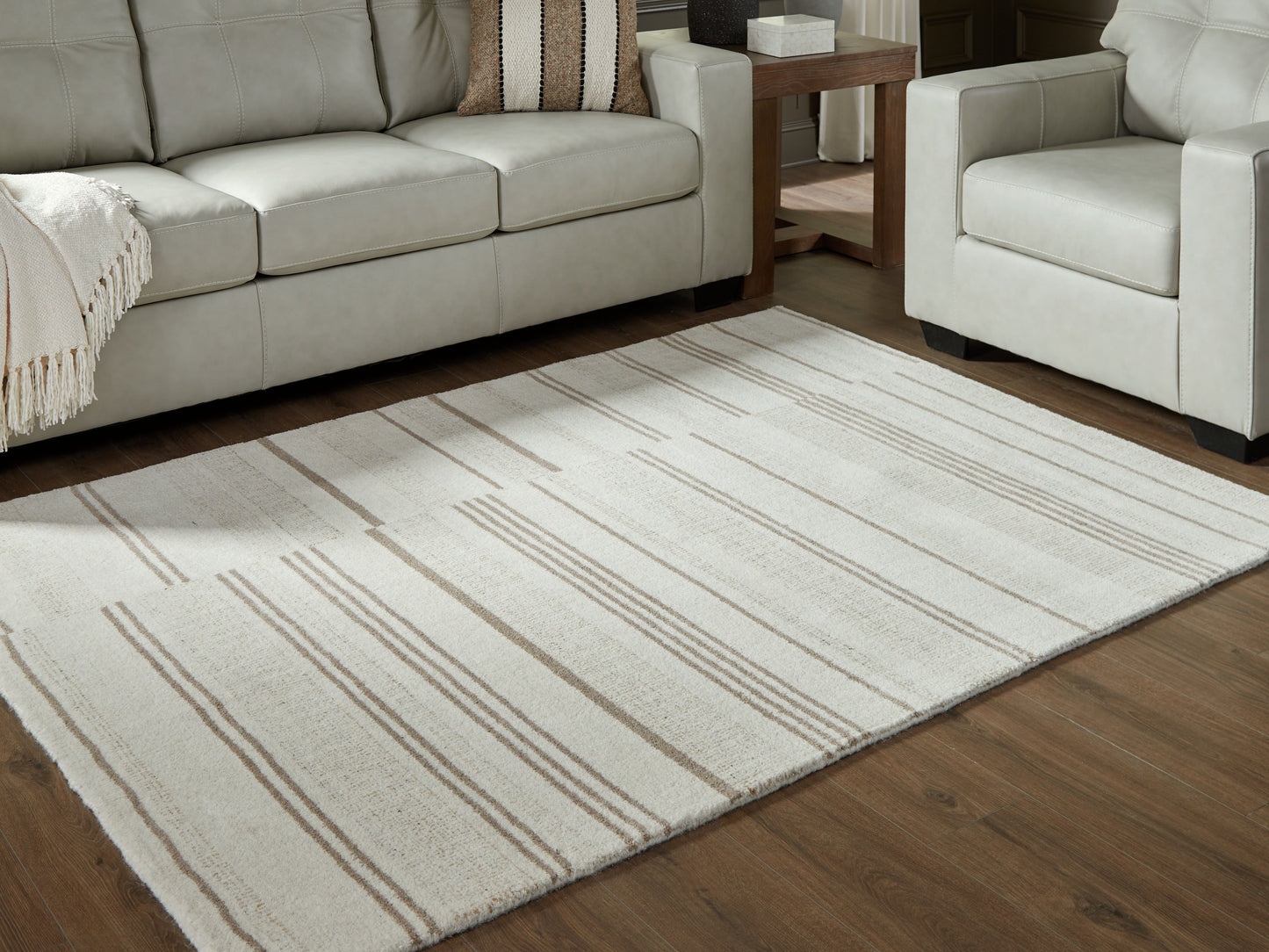 The Furniture Outlets - Ashley Furniture - Gadence Rug - 5' x 7' Area Rug / Ivory/Tan - R407642