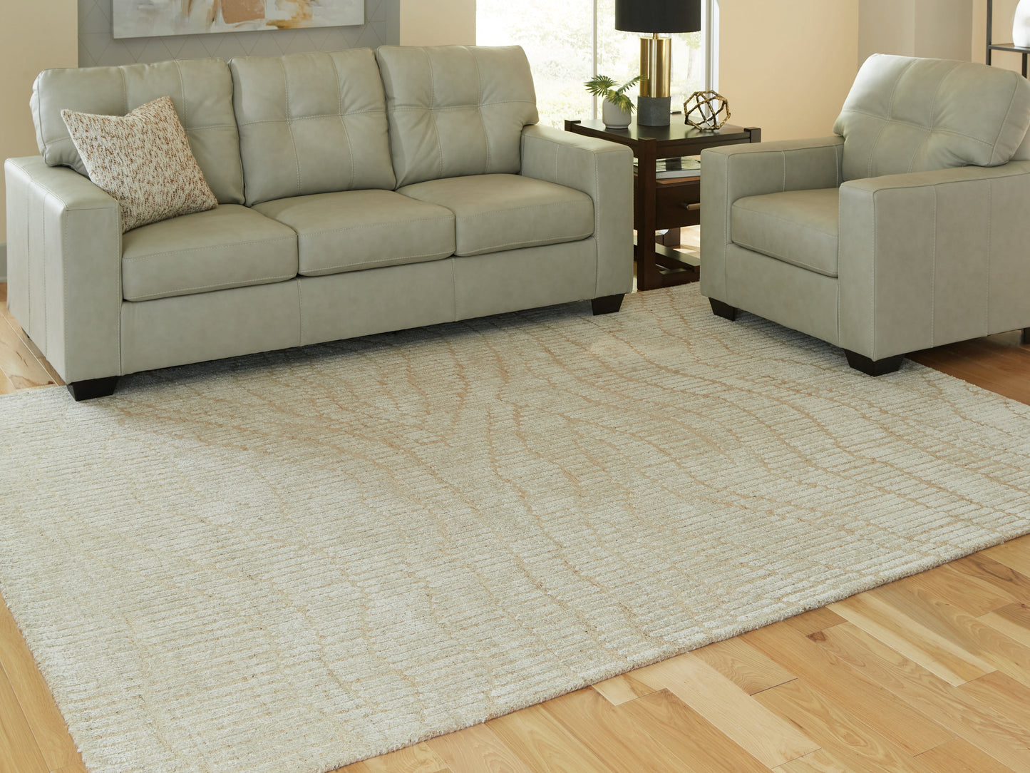 The Furniture Outlets - Ashley Furniture - Jaseena Rug - 7'8" x 10' Area Rug / Beige/Tan - R407721