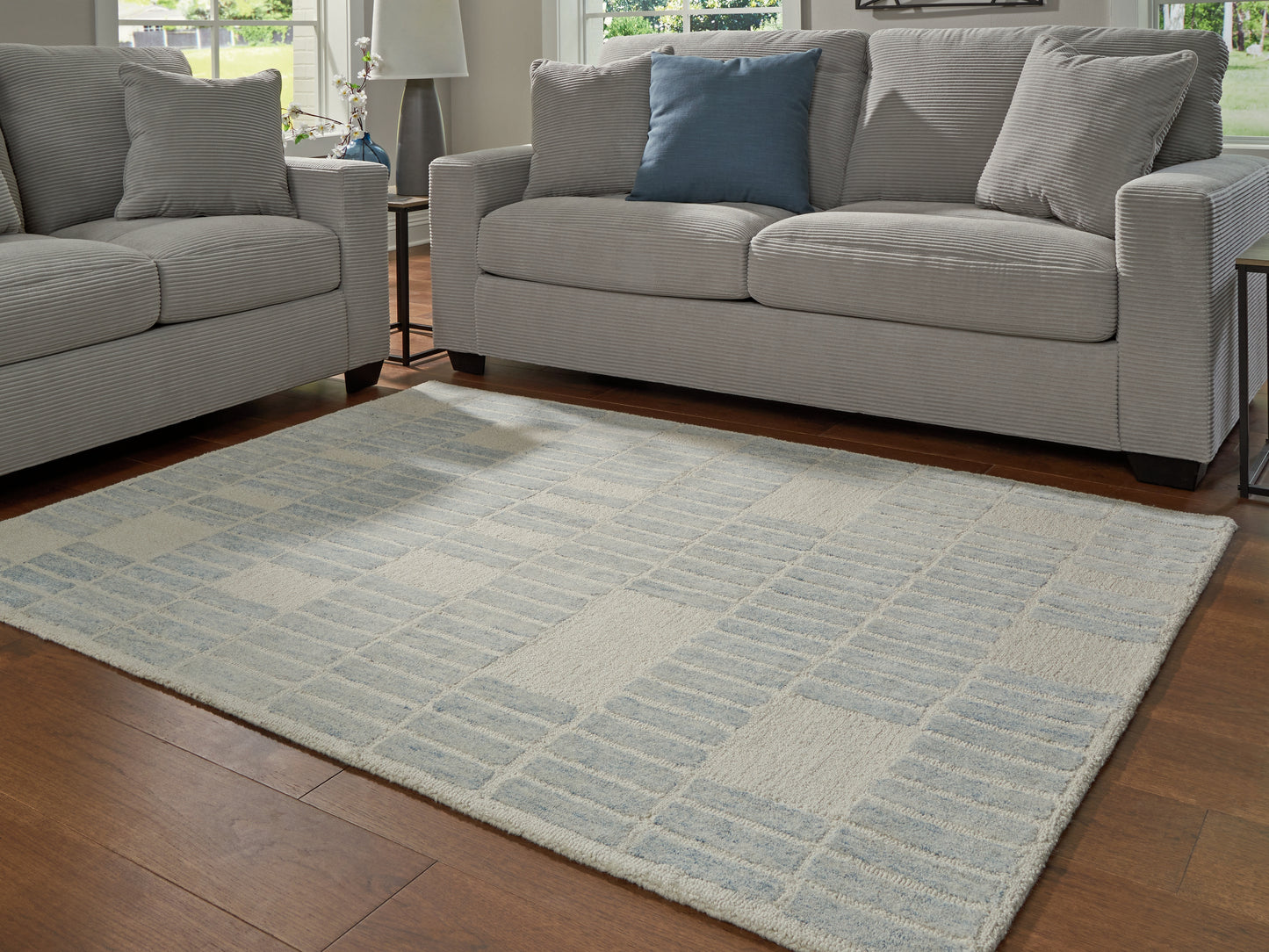 The Furniture Outlets - Ashley Furniture - Dylanton Rug - 5' x 7' Area Rug / Ivory/Blue - R407812