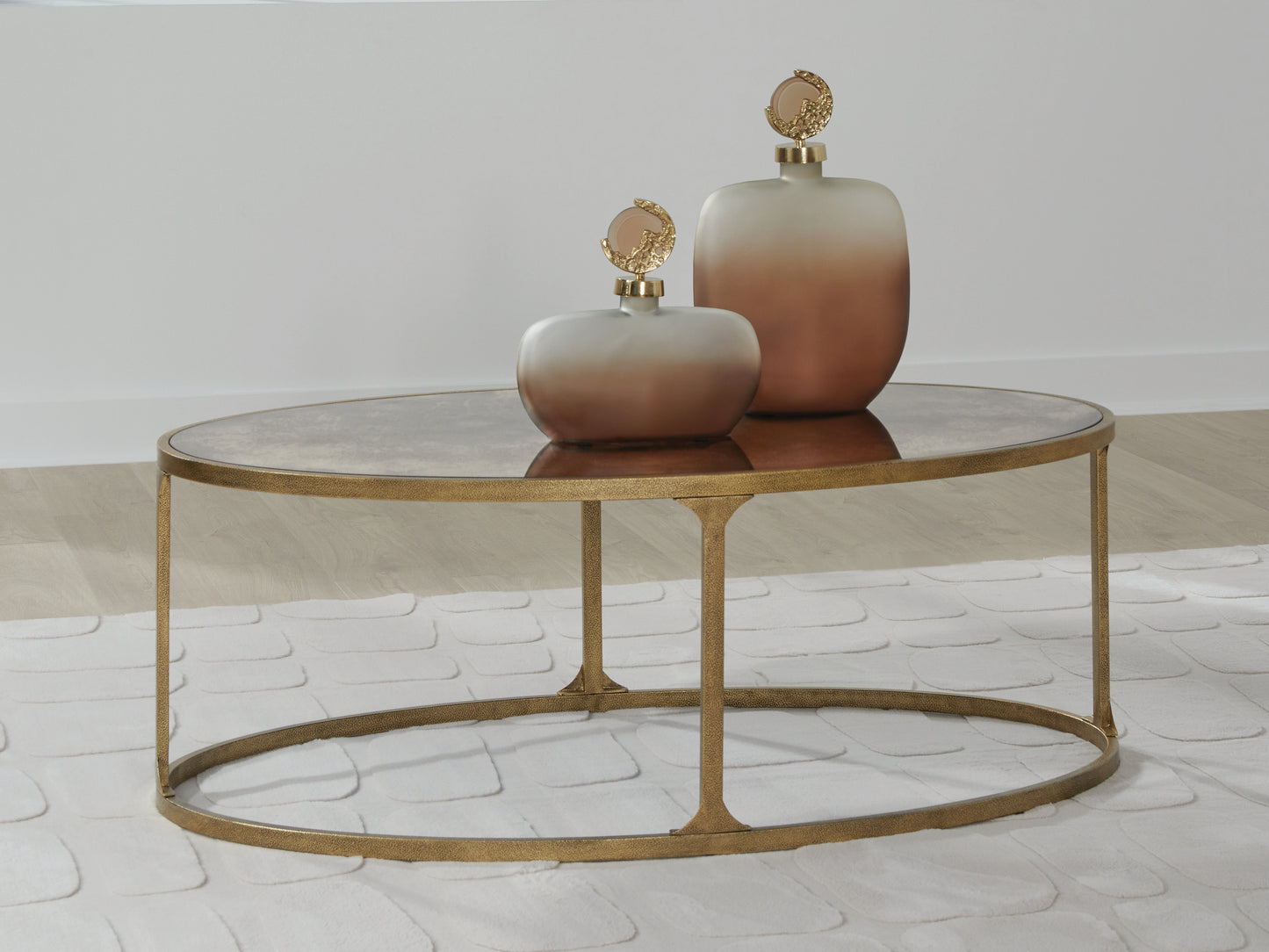 The Furniture Outlets - Ashley Furniture - Korajane Coffee Table - Oval Cocktail Table / Antique Gold - T399-0