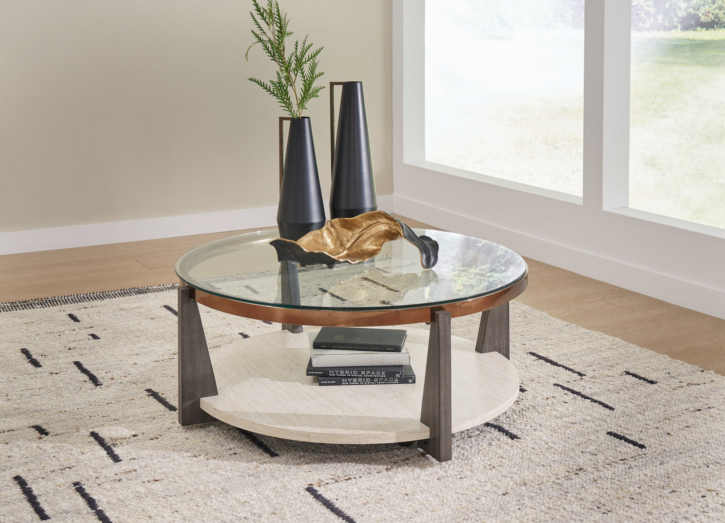 The Furniture Outlets - Ashley Furniture - Frazwa Coffee Table - Round Cocktail Table / Multi - T432-8