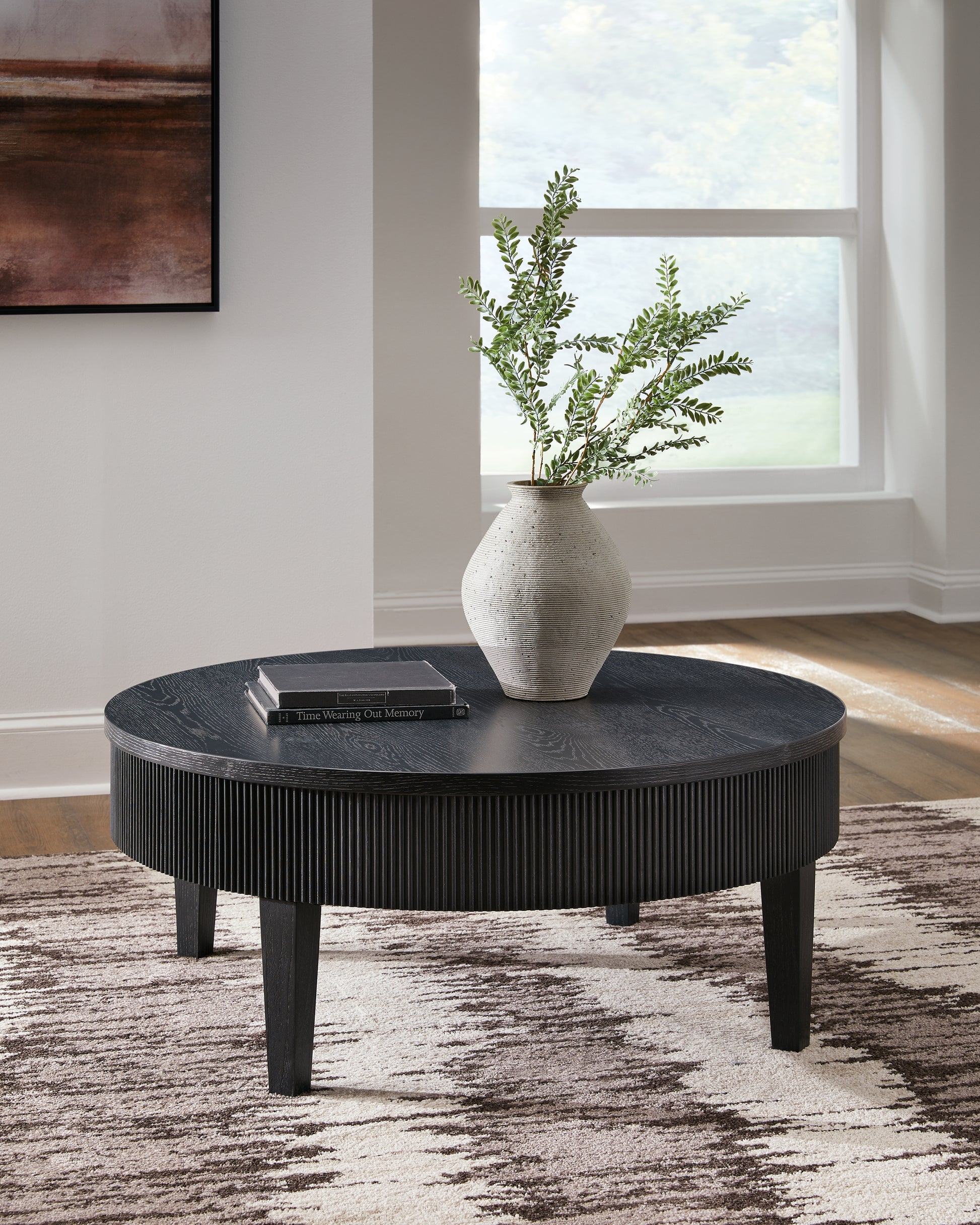 The Furniture Outlets - Ashley Furniture - Marstream Coffee Table - Round Cocktail Table / Black - T551-8