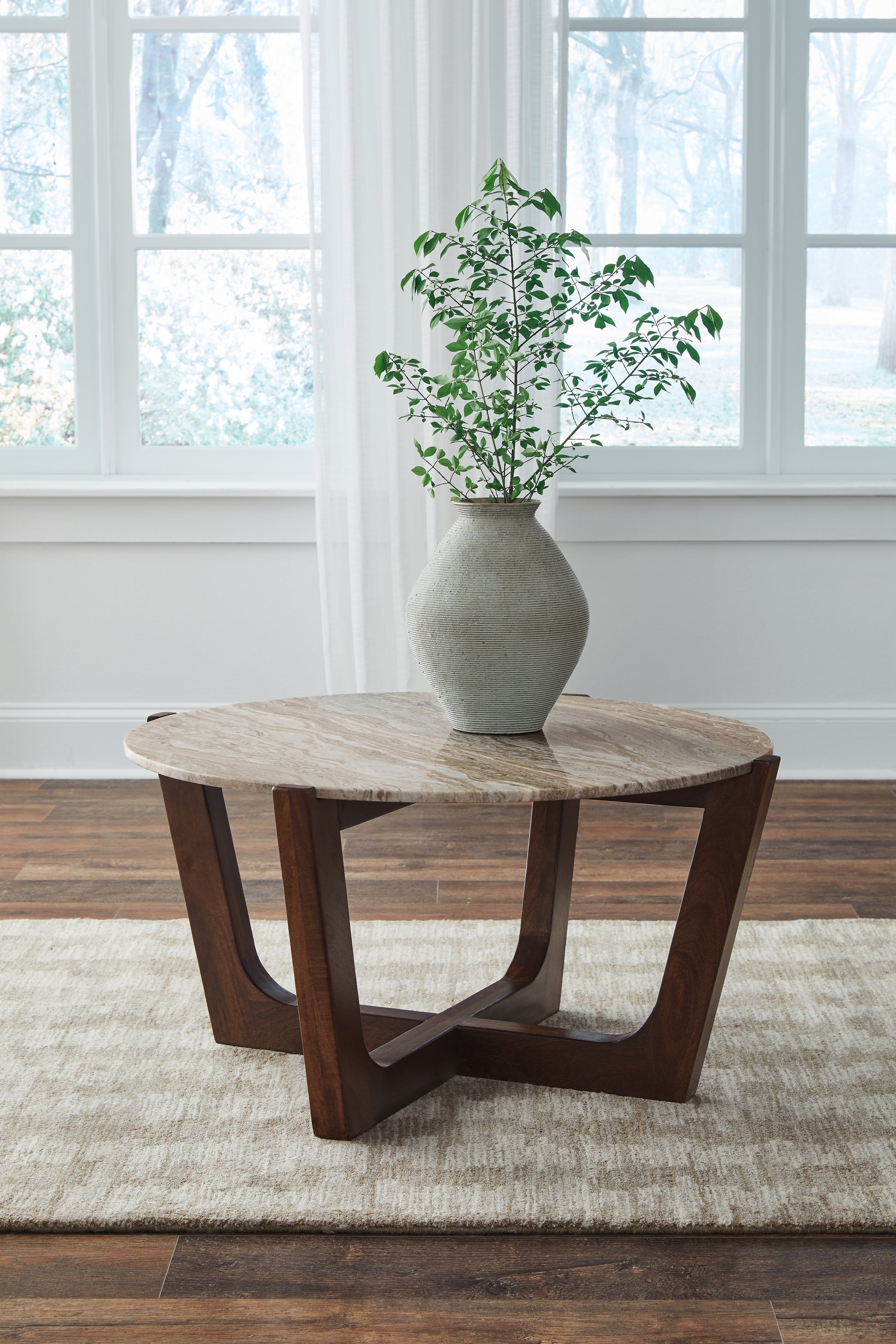 The Furniture Outlets - Ashley Furniture - Tanidore Coffee Table - Round Cocktail Table / Warm Brown - T667-8