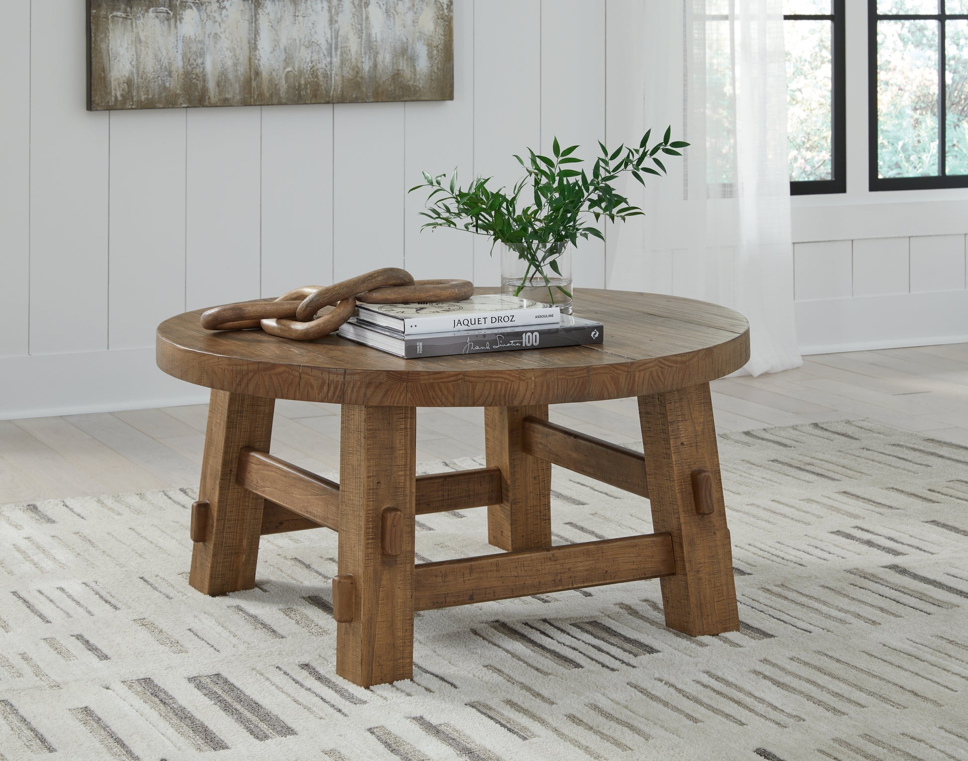 The Furniture Outlets - Ashley Furniture - Mackifeld Coffee Table - Round Cocktail Table / Warm Brown - T724-8