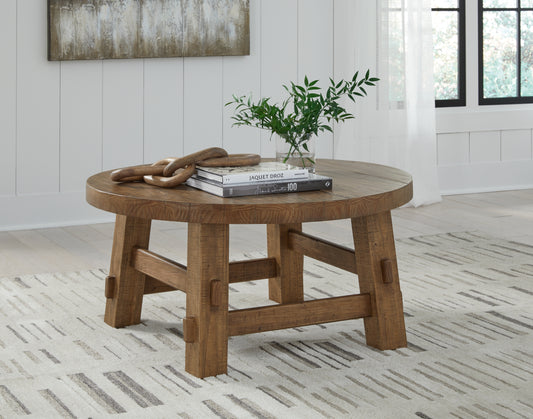 The Furniture Outlets - Ashley Furniture - Mackifeld Coffee Table - Round Cocktail Table / Warm Brown - T724-8