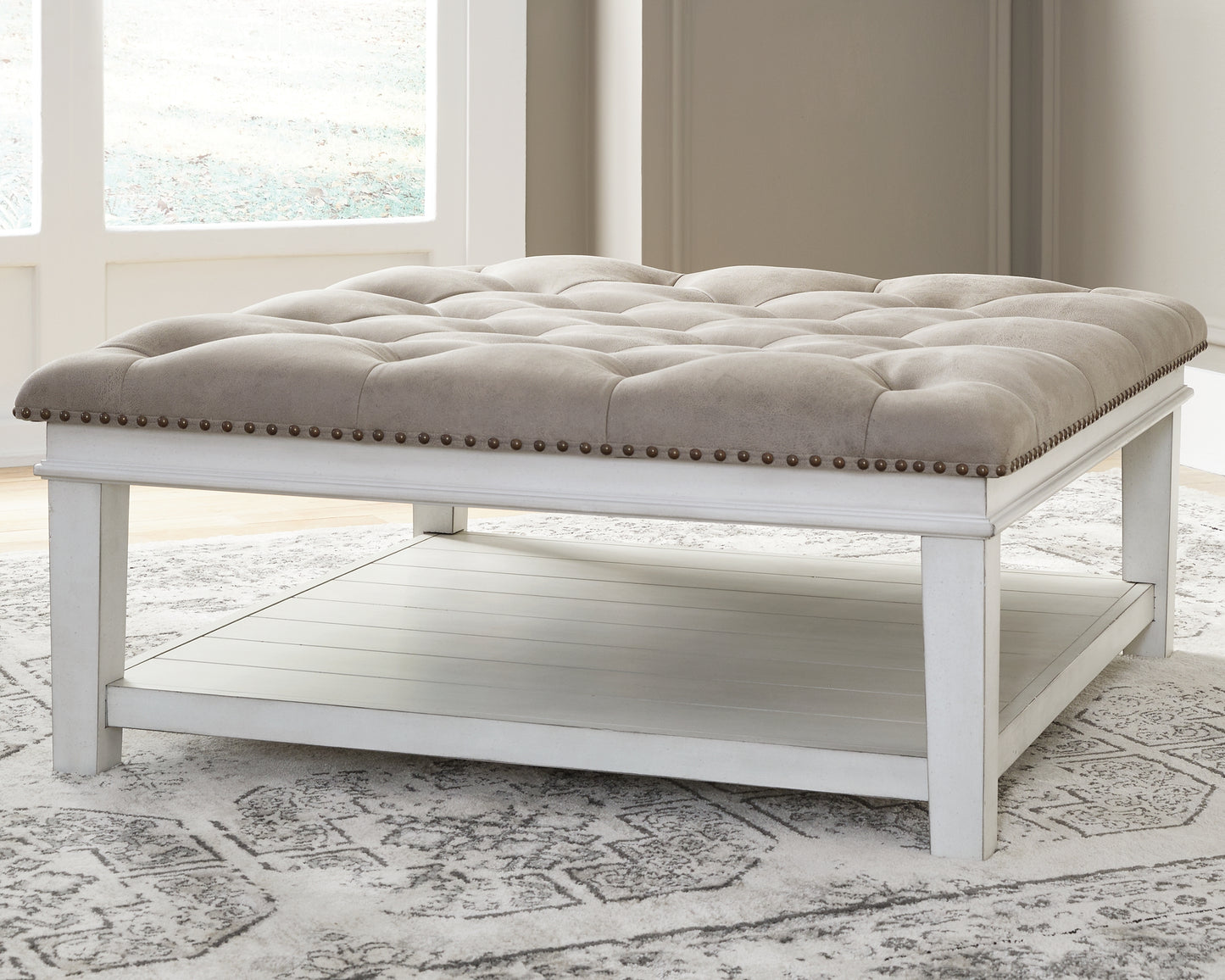 The Furniture Outlets - Ashley Furniture - Kanwyn Upholstered Ottoman Coffee Table - UPH Ottoman Cocktail Table / Whitewash - T937-21