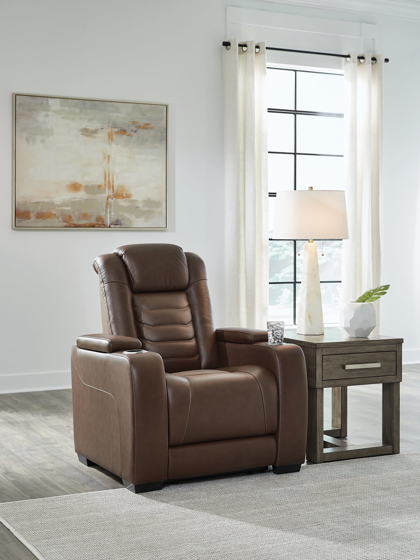 The Furniture Outlets - Ashley Furniture - High Impact Living Room - PWR Recliner/ADJ Headrest / Tobacco - U1060113