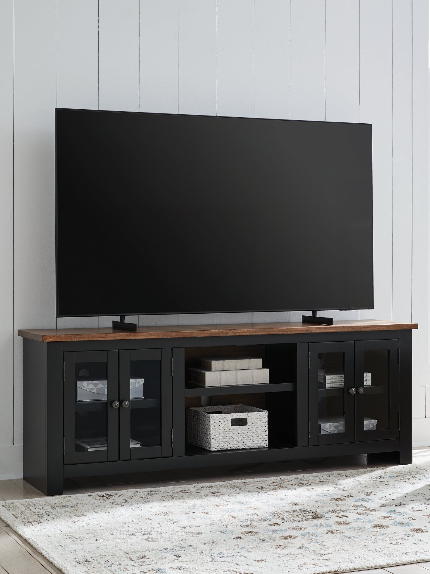The Furniture Outlets - Ashley Furniture - Wildenauer 76" TV Stand - 76" / Brown/Black - W664-68