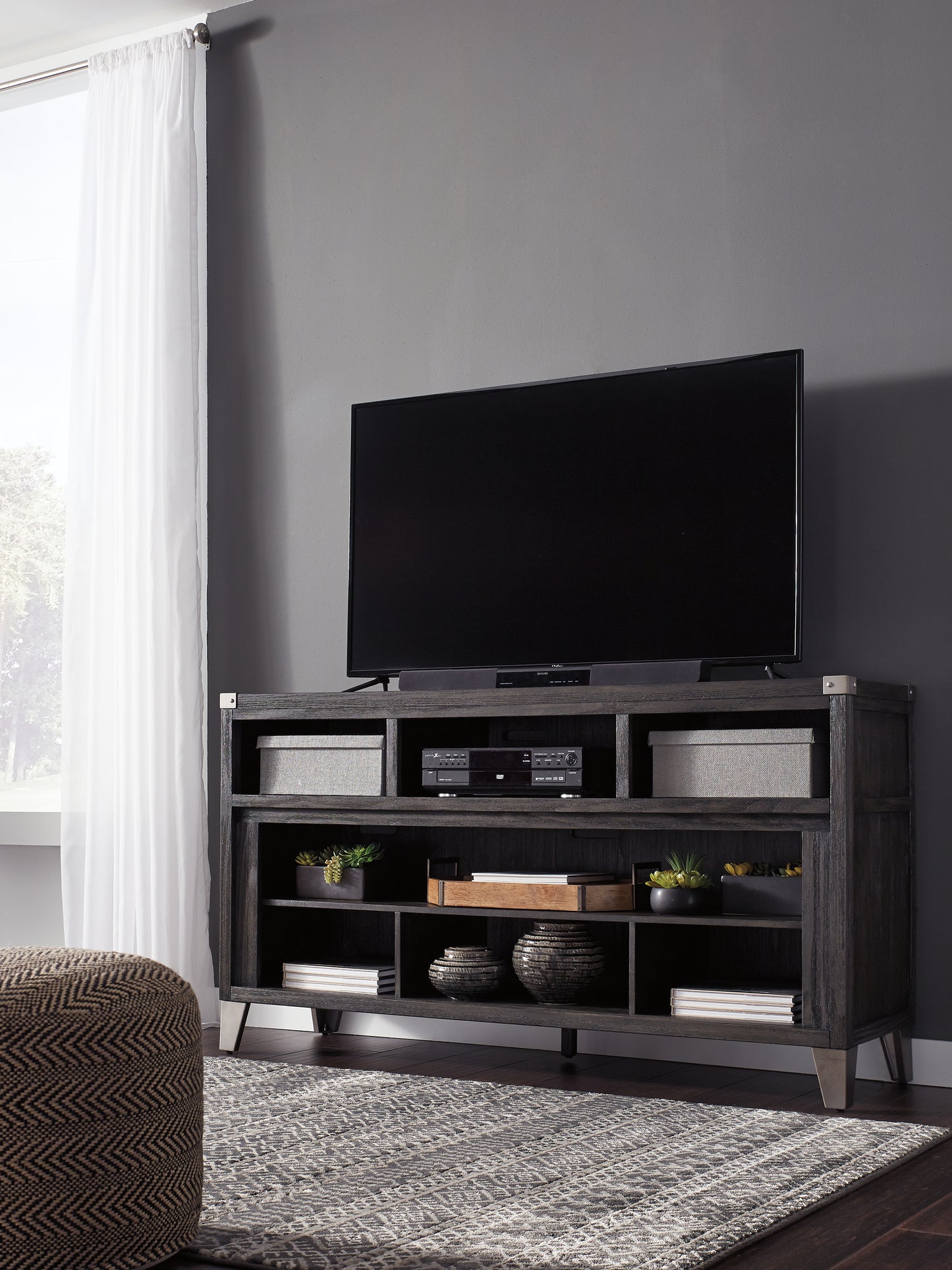 The Furniture Outlets - Ashley Furniture - Todoe 65" TV Stand - 65" / Gray - W901-68