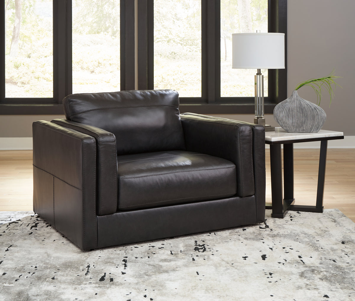 The Furniture Outlets - Ashley Furniture - Amiata Living Room - Chair and a Half / Onyx - 5740523
