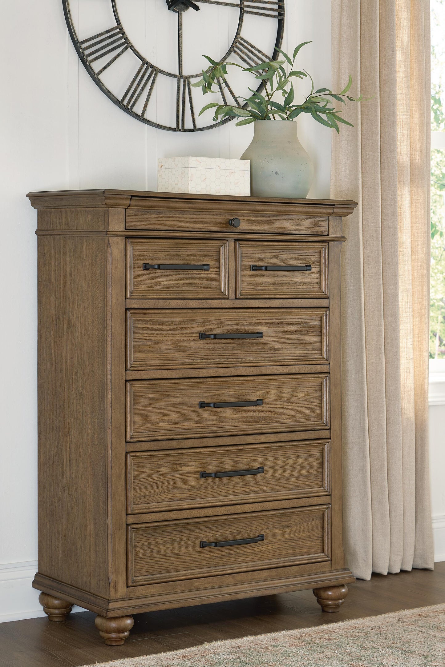 The Furniture Outlets - Ashley Furniture - Karallin Bedroom - Seven Drawer Chest / Medium Brown - PCB782-46