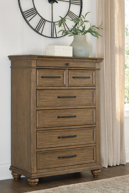 The Furniture Outlets - Ashley Furniture - Karallin Bedroom - Seven Drawer Chest / Medium Brown - PCB782-46