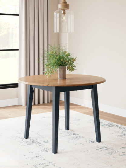 The Furniture Outlets - Ashley Furniture - Gesthaven Dining Room - Round DRM Drop Leaf Table / Natural/Blue - D399-15