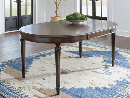 The Furniture Outlets - Ashley Furniture - Lavinton Dining Room - Oval Dining Room EXT Table / Brown - D764-35
