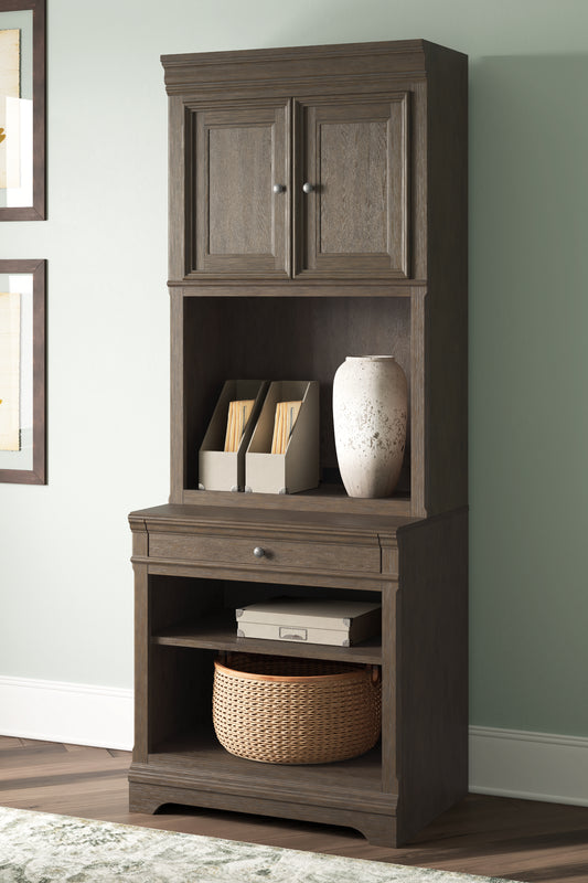 The Furniture Outlets - Ashley Furniture - Janismore Bookcase - Bookcase / Weathered Gray - H776H7
