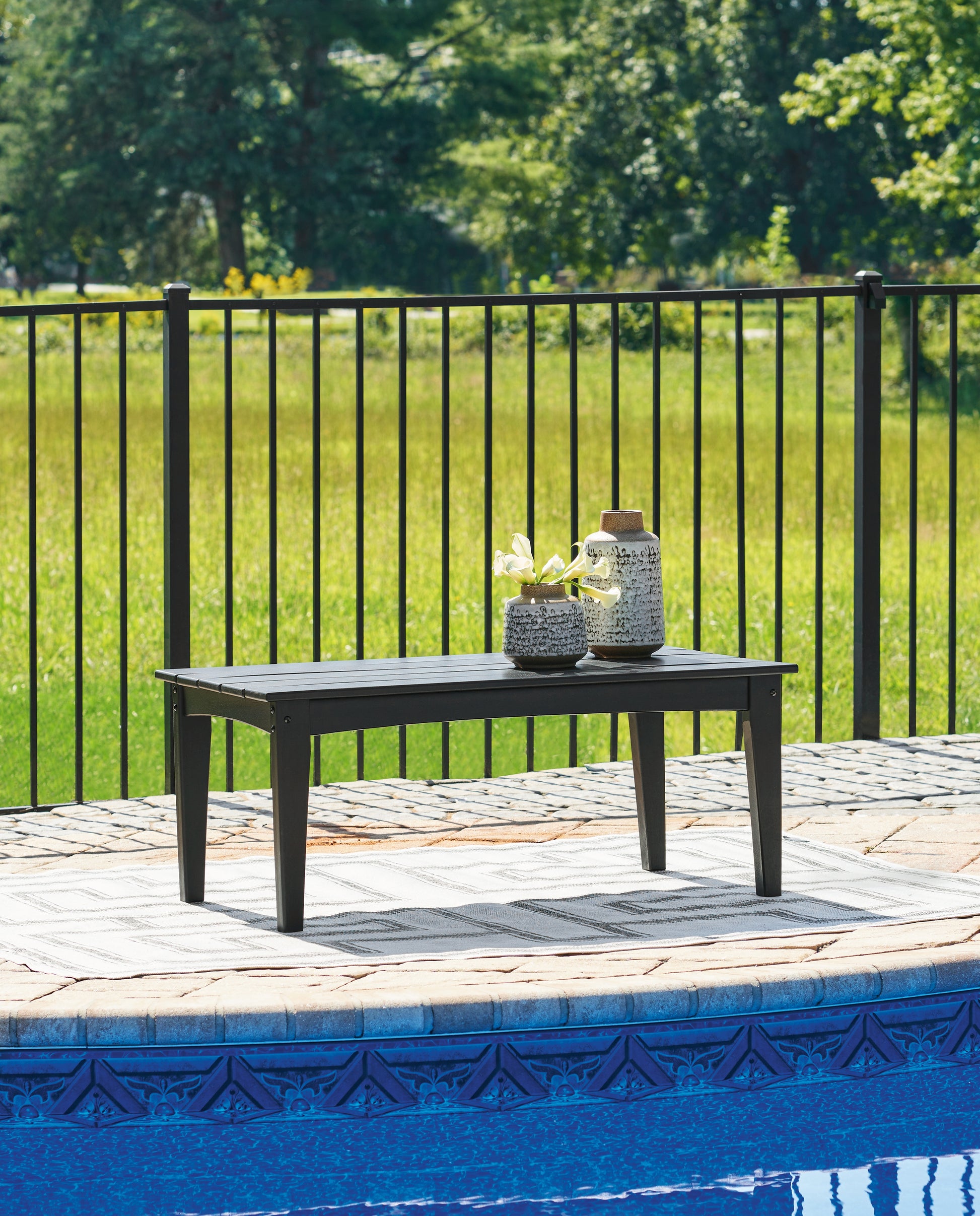 The Furniture Outlets - Ashley Furniture - Hyland wave Outdoor - Rectangular Cocktail Table / Black - P108-701