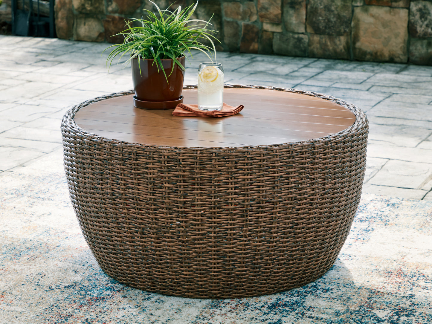 The Furniture Outlets - Ashley Furniture - Double Point Outdoor - Round Cocktail Table / Beige - PCP503-708