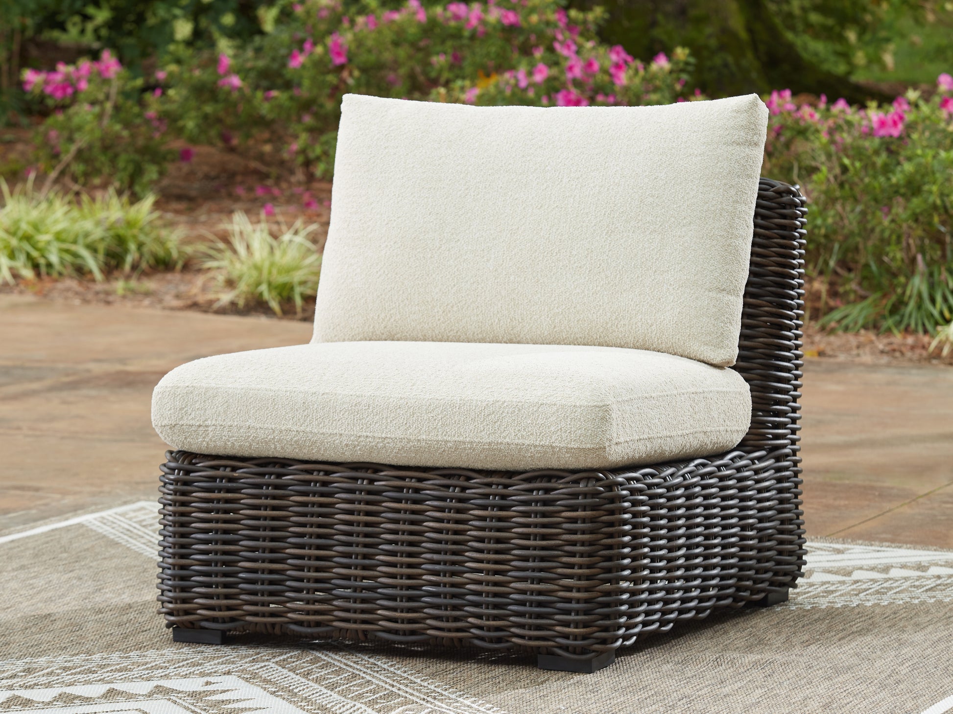 The Furniture Outlets - Ashley Furniture - Kimora Outdoor - Armless Chair w/Cushion / Beige/Dark Brown - P711-846