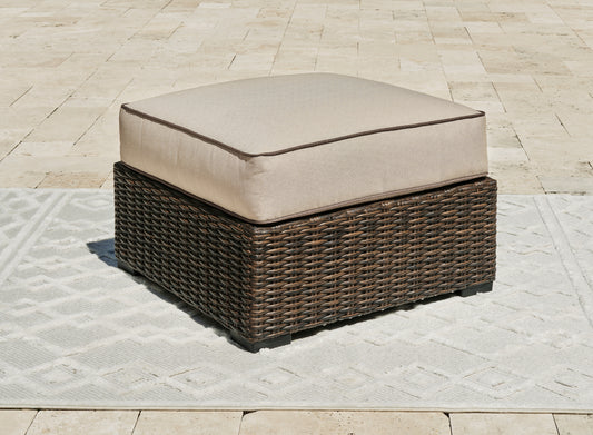 The Furniture Outlets - Ashley Furniture - Coastline Bay Outdoor - Ottoman with Cushion / Brown - P784-814