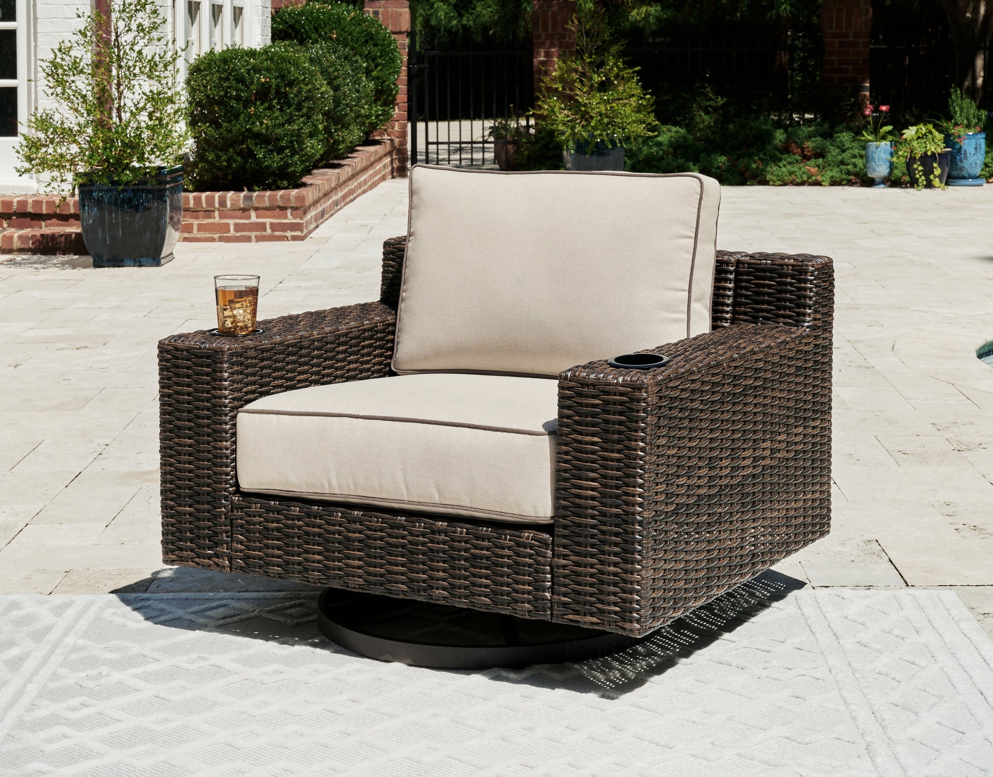 The Furniture Outlets - Ashley Furniture - Coastline Bay Outdoor - Swivel Lounge w/ Cushion / Brown - P784-821