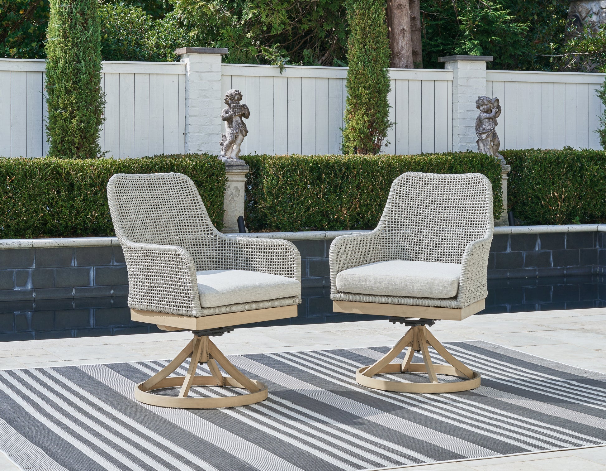 The Furniture Outlets - Ashley Furniture - Seton Creek Outdoor - Swivel Chair w/Cushion (Set of 2) / Gray - P798-602A