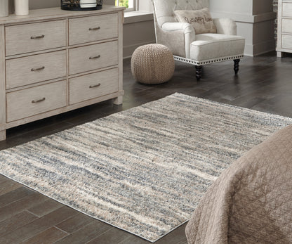 The Furniture Outlets - Ashley Furniture - Gizela Rug - 7'10" x 10' Rug / Ivory/Beige/Gray - R404861