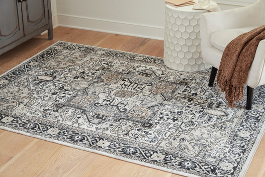 The Furniture Outlets - Ashley Furniture - Gregmoore Rug - 5'2" x 6'10" Washable Rug / Multi - R405822