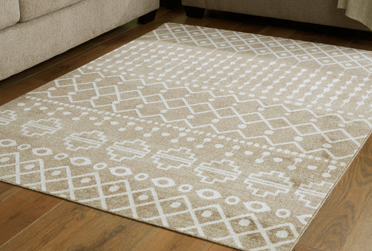 The Furniture Outlets - Ashley Furniture - Bunchly Rug - 4'11" x 7'2" Washable Rug / Tan/Brown/Cream - R406222