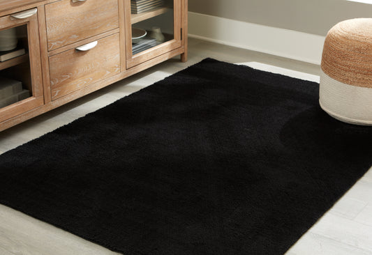 The Furniture Outlets - Ashley Furniture - Anaben Rug - 8' x 10'1" Washable Rug / Black - R406311