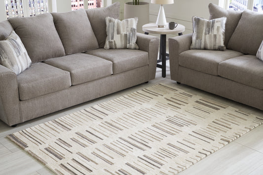 The Furniture Outlets - Ashley Furniture - Leesdale Rug - 8' x 10' Rug / Ivory/Brown/Black - R406421