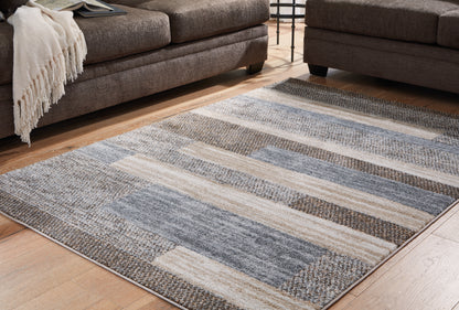 The Furniture Outlets - Ashley Furniture - Sethburn Rug - 8' x 10' Rug / Cream/Brown/Gray - R406591