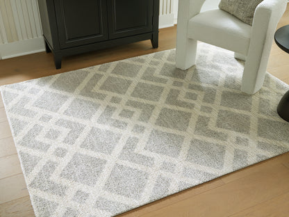 The Furniture Outlets - Ashley Furniture - Unawick Rug - Medium Rug / Gray/Ivory - R407332