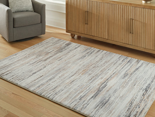 The Furniture Outlets - Ashley Furniture - Nace Rug - 7'6" x 9'6" Area Rug / Gray/Brown/White - R407471