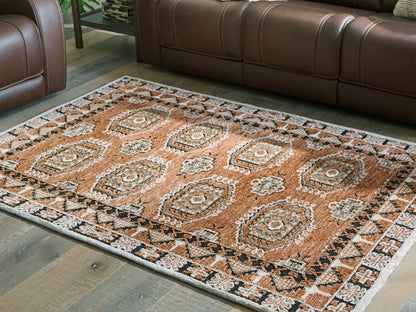 The Furniture Outlets - Ashley Furniture - Qaabiz Rug - 5' x 7' Area Rug / Sienna/Ivory/Black - R407522
