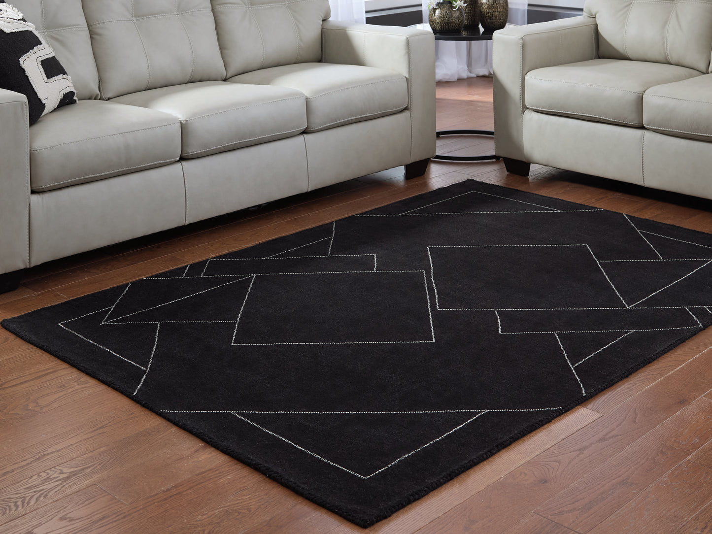 The Furniture Outlets - Ashley Furniture - Marav Rug - 5' x 7' Area Rug / Black/White - R407532
