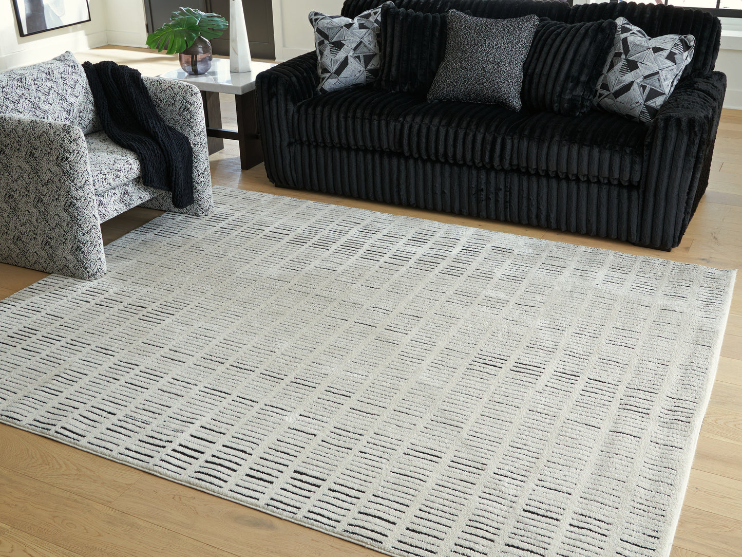The Furniture Outlets - Ashley Furniture - Turinwith Rug - 7'10" x 9'10" Area Rug / Ivory/Black - R407551