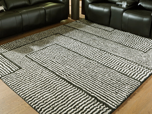 The Furniture Outlets - Ashley Furniture - Kurtmen Rug - 7'10" x 9'10" Area Rug / Black/Ivory - R407591