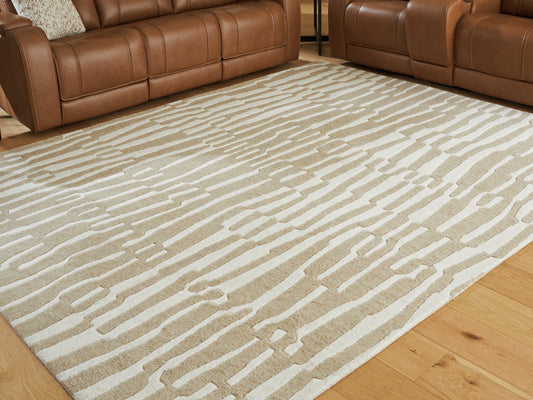The Furniture Outlets - Ashley Furniture - Corrbell Rug - 7'8" x 10' Area Rug / Beige/White - R407631