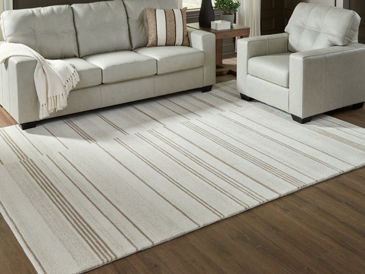 The Furniture Outlets - Ashley Furniture - Gadence Rug - 5' x 7' Area Rug / Ivory/Tan - R407642
