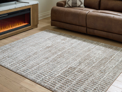 The Furniture Outlets - Ashley Furniture - Fuadwick Rug - 5'3" x 7' Area Rug / Multi - R407692