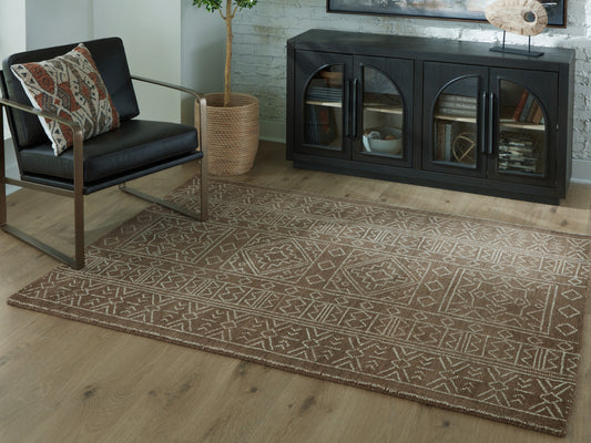 The Furniture Outlets - Ashley Furniture - Merrittman Rug - 7'8" x 10' Area Rug / Brown/Ivory - R407701