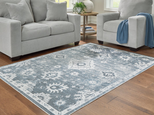 The Furniture Outlets - Ashley Furniture - Avanworths Rug - Washable 7'10" x 10' Area Rug / Blue/Gray/Ivory - R407791