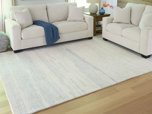 The Furniture Outlets - Ashley Furniture - Genemost Rug - 5' x 7' Area Rug / Ivory/Blue - R407842
